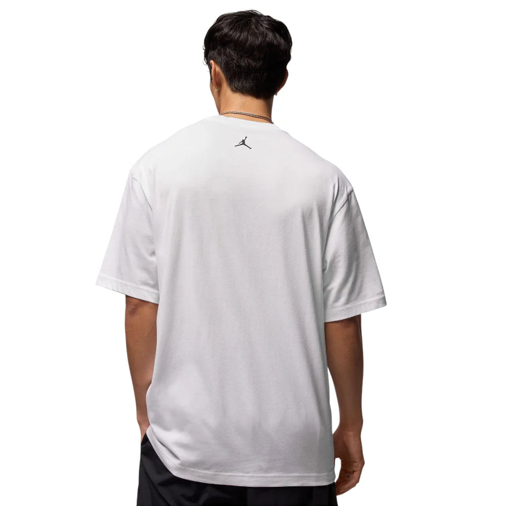 Camiseta blanca con foto de alas