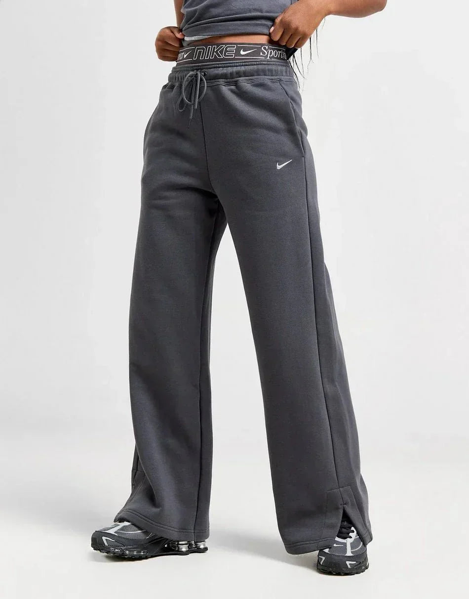 Pantalones deportivos Nike de pierna ancha para mujer